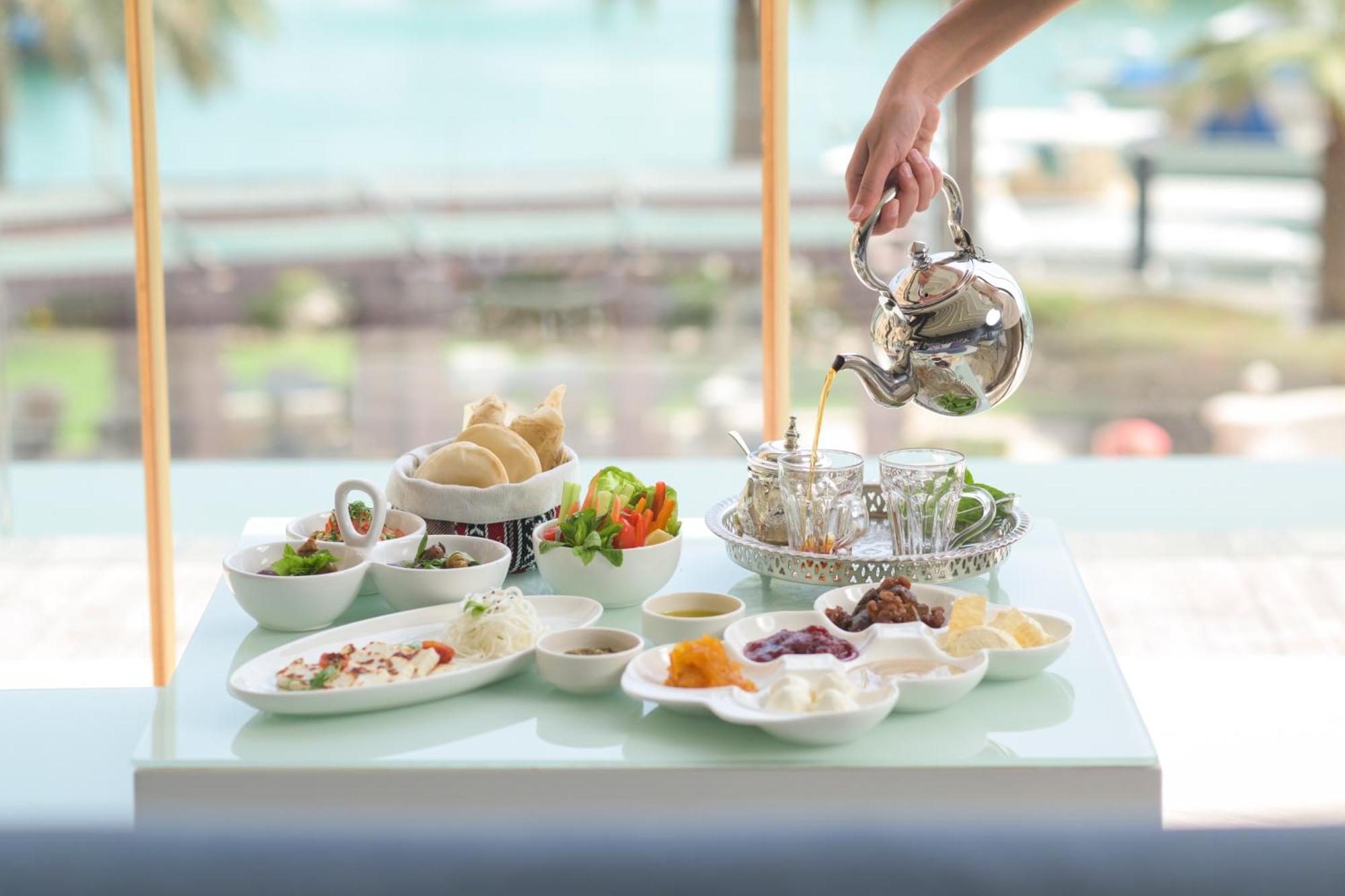 Four Seasons Hotel Доха Экстерьер фото Israeli cuisine