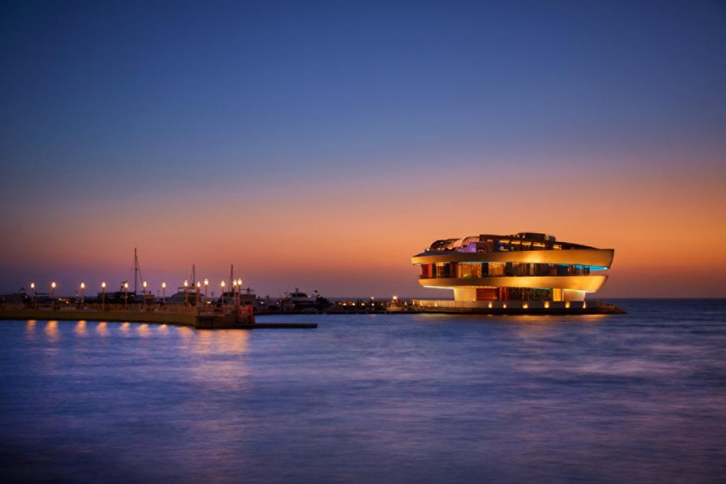 Four Seasons Hotel Доха Экстерьер фото The casino at night